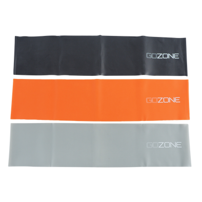 Pack de 3 bandes de résistance couchées ensemble. Lourd (noir), moyen (orange) et gris (léger).