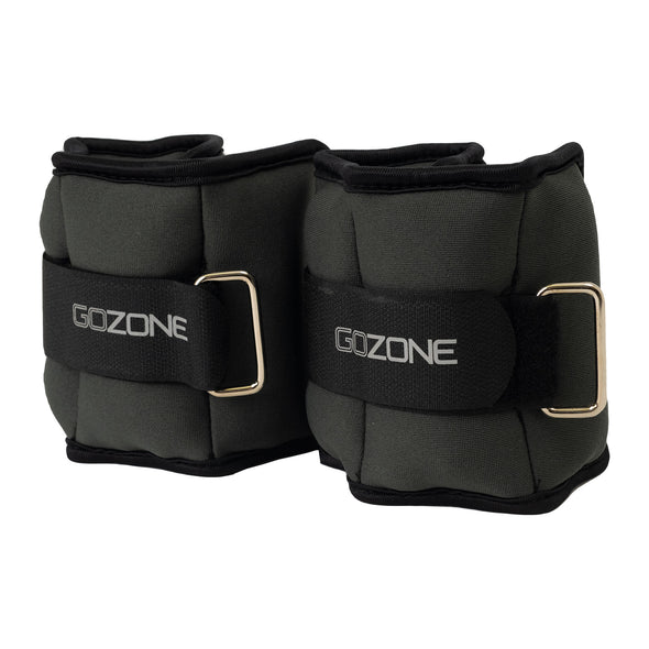 2 poids pour chevilles/poignets enroulés, photographiés de côté, avec le logo GoZone.