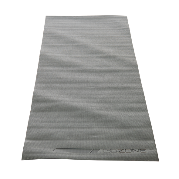 Tapis de yoga gris de 3 mm, déroulé, vu du dessus