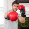 Man with red training gloves from the POV of his sparring partner
