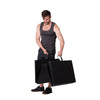 Man folding and carrying fitness mat