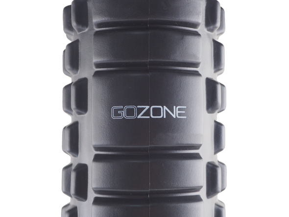 Closeup of GoZone logo and textured massage roller surface
