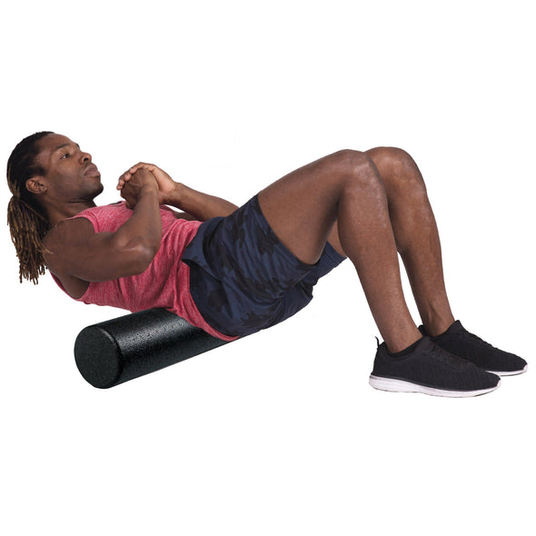 Man massaging lower back with high-density foam roller