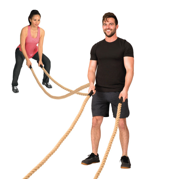Shot of woman and man separately using battle ropes