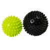 2 spiky therapy massage balls, one green, one black